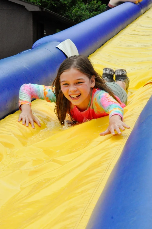 Girl on water slide. 